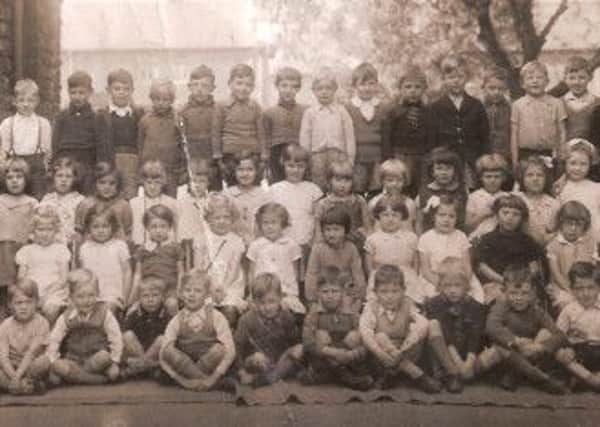 SCHOOL DAYS This photograph is of Earlsheaton Infants School, and the name on the back is Bernard Normally.