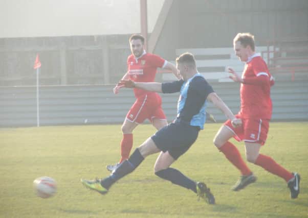 Liversedge's Andy Wood in action against Bridlington Town