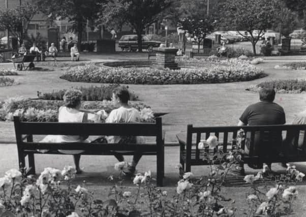 People sitting in Green Park, Heckmondwike, in 1991. (d123n002)