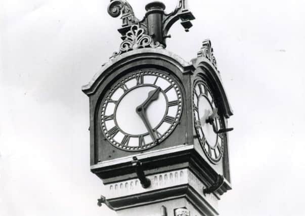 COMMEMORATIVE CLOCK Heckmondwike's clock was in need of repairs back in 1995.