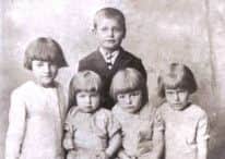 Pictured are five of the children Rhoda's sister left behind, and whom Rhoda helped raise. They are from left to right, Patience, Mary, Betty, Hilda, and Tom standing behind.
