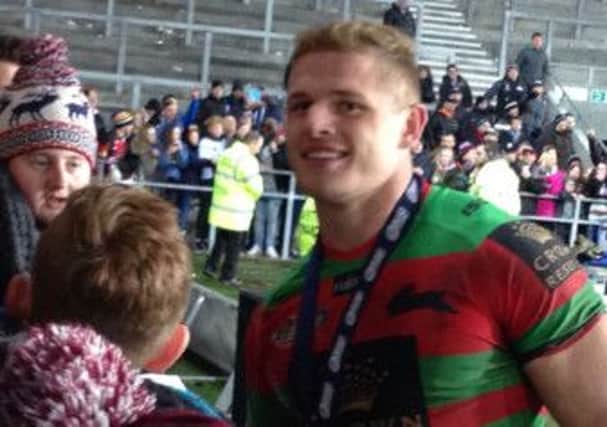 Tom Burgess catches up with Dewsbury Moor fans  after helping South Sydney win the World Club Challenge.