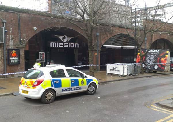 A police cordon outside Club Mission after a 23-year-old man was critically injured in an attack