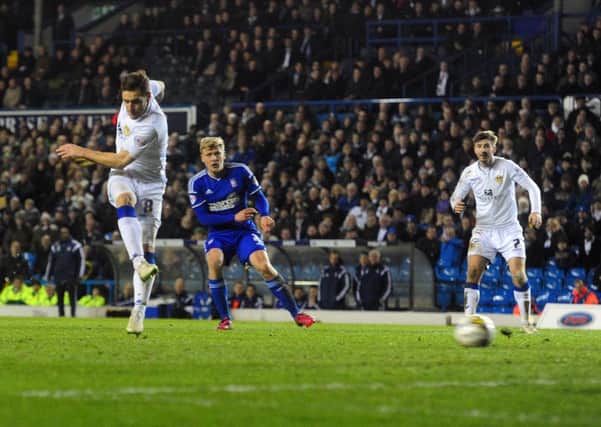 Billy Sharp fires in the winning goal for Leeds United against Ipswich. PIC: Tony Johnson