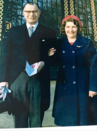Ivy Hawkins and her husband with the MBE in 1978.
