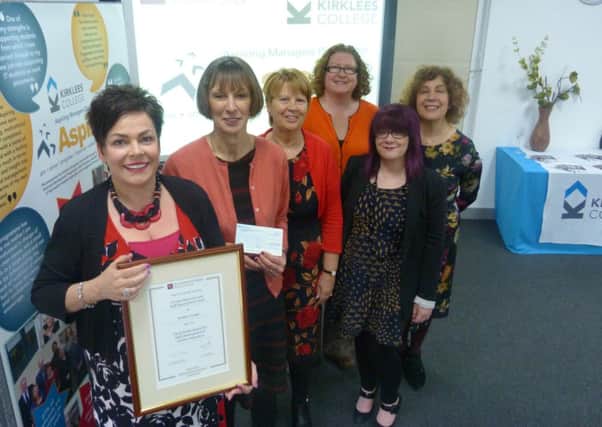 Kirklees College receiving the  Association of Colleges Beacon Award for staff development.