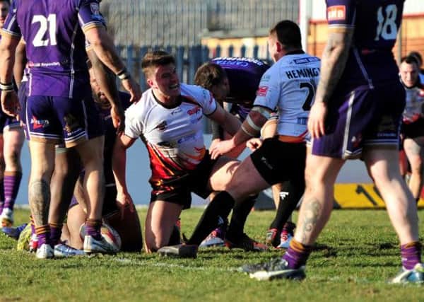 A delighted Luke Adamson celebrates scoring a try on his Dewsbury Rams debut against Whitehaven in Sundays Kingstone Press Championship clash.