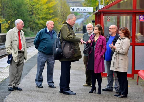 Batley councillors met Peter Myers from Northern Rail at Batley Station to discuss the cleanup campaign last year. (D522J444)