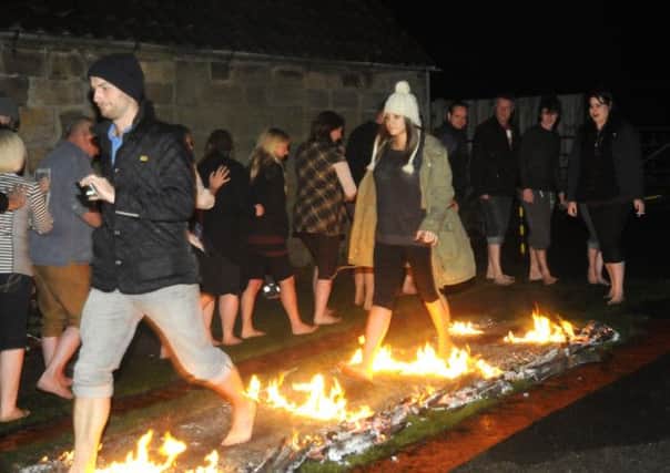 Fox and Hounds staff will join regulars and walk across hot coals for charity.