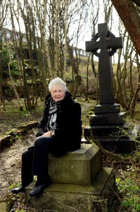 NEW SPACE The Revd Ann Pollard at the old St Peters Church graveyard in Earlsheaton.