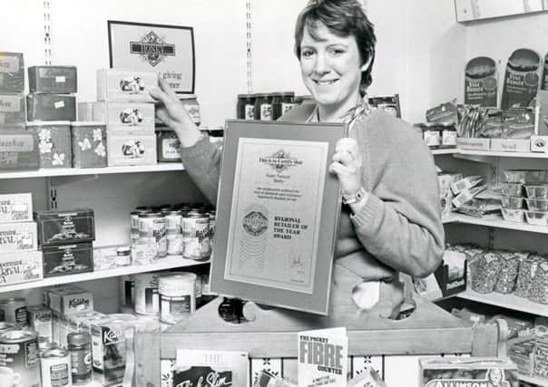 Melinda Brooke celebrates after being named Regional Retailer of the Year in 1981.