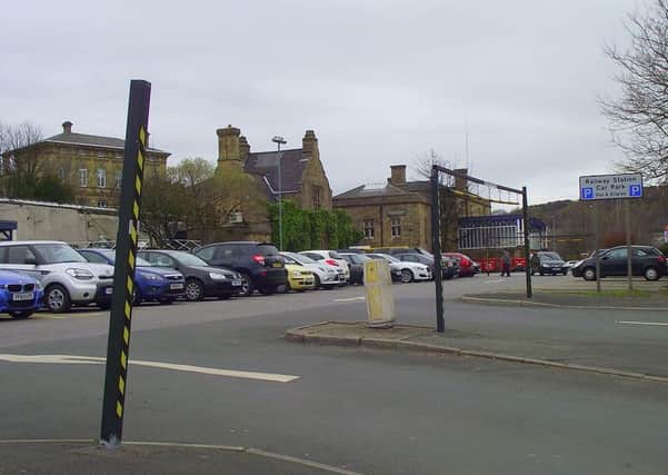Damage to the barriers at the entrance to the car park at Dewsbury station.