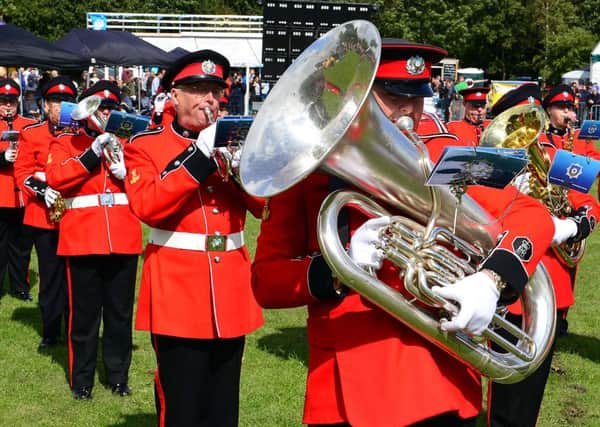 The West Yorkshire Fire and Rescue Brass Band at the 2014 Mirfield Show.