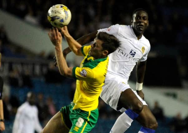 Leeds United debutant Granddi Ngoyi up against former Whites skipper Jonny Howson.