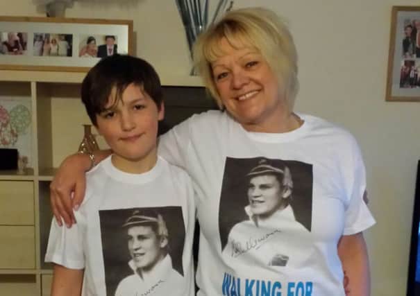 Sue Morton-Tate and grandson Iestyn Welsh are taking on a walk to raise money for Alzheimer's in dedication to sporting legend Mick Sullivan.