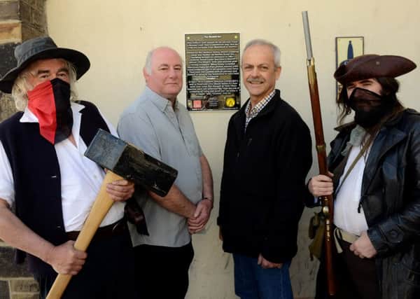 Shears landlord Paul Black (centre left) and Max Rathmel (Spen Valley Civic Society) with members of the Frayed Knot Society.