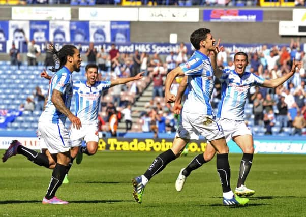 Mark Hudson celebrates scoring the Terriers' second goal against County.  Picture Bruce Rollinson