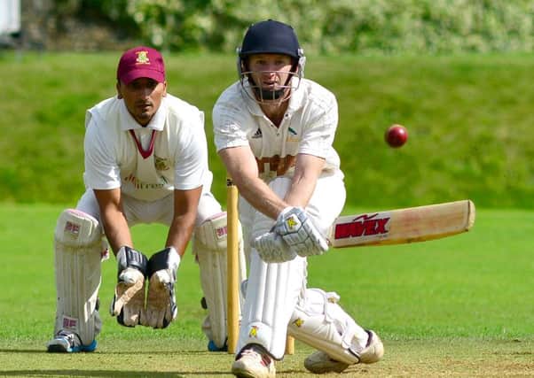 Gary Fellows hit 10 fours and eight sixes on his way to an unbeaten 116 not out as Hanging Heaton eased into the  Heavy Woollen Cup second round.