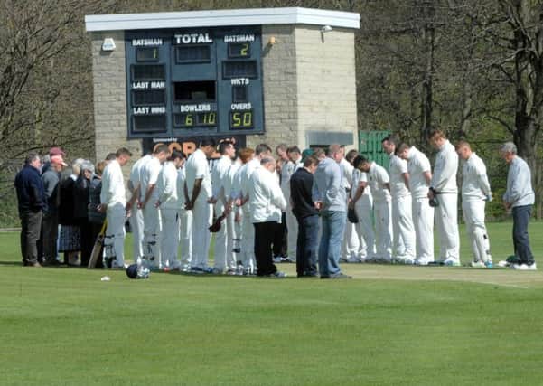 Woodlands and New Farnley players and well wishers pay their respects to Peter Graham who died on the eve of the new JCT600 Bradford League season.