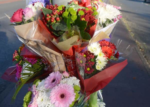 Flowers left at the scene of the accident which claimed the life of Sarah Binns.