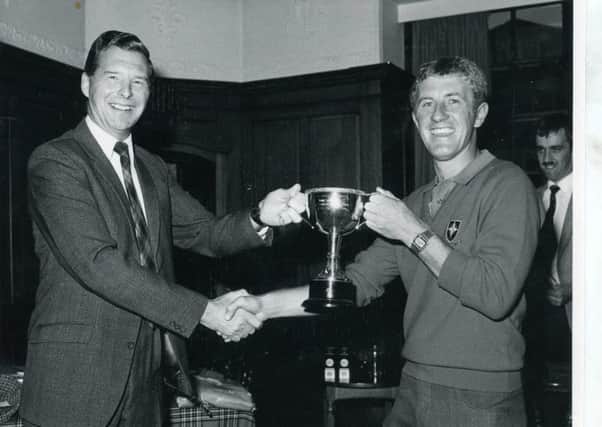 Rod Shimwell receives his BAC Golfing Trophy in 1983.