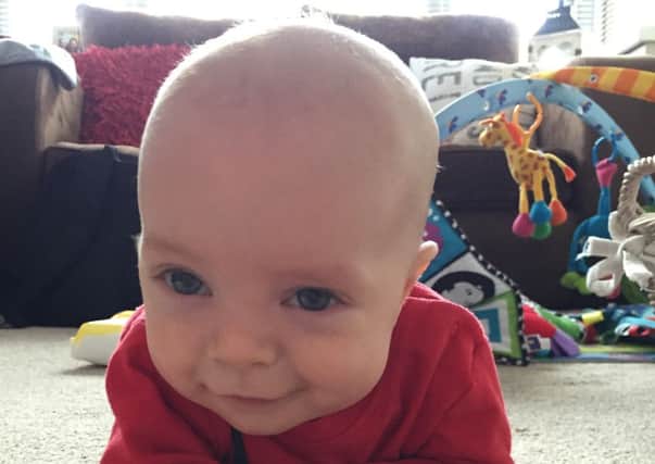 LUCKY LAD Finley is now six months old and still the size of a newborn, but has not needed to return to hospital.