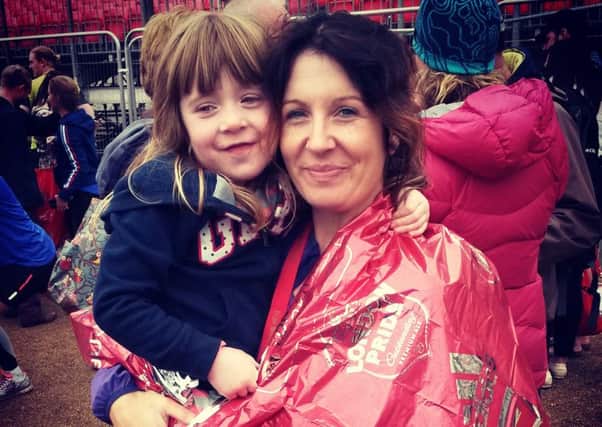 Laura with daughter Ruby after she completed the London Marathon.