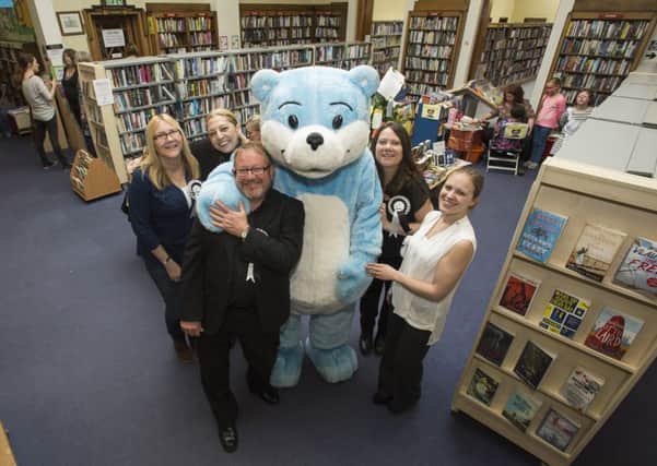 Picture by Allan McKenzie/YWNG - 090515 - Press - Cleckheaton Literary Festival, Cleckheaton Library, Cleckheaton, England - Mandy Huggins, Pauline Scatterty, Martin Webster, Karen Naylor & Laura Hobson-Tyas with Bookstart Bear at the Cleckheaton Literary festival in Cleckheaton Library.