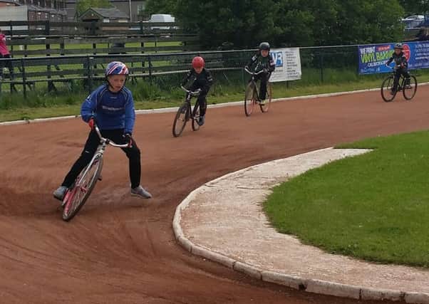 Will Naylor takes the lead for Heckmondwike Cycle Speedway.