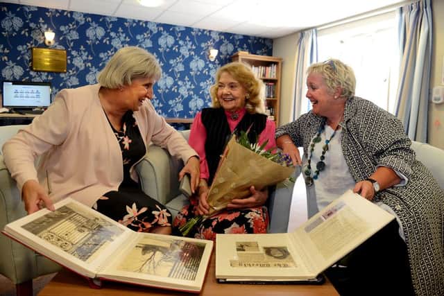 Newspaper: Spenborough Guardian.
Story: Kirklees council's extra housing care scheme.
Pictured: Former 1940's pin-up girl Doreen Fletcher (centre) with L) Cllr Viv Kendrick - Cabinet member for adult social care, and R) Sue Richards - Kirklees council assistant director of social care for adults. 
Doreen is a resident at Meadow Green, Heckmondwike.
Photo Date: 04/06/15
Photo Ref: AB061b0615