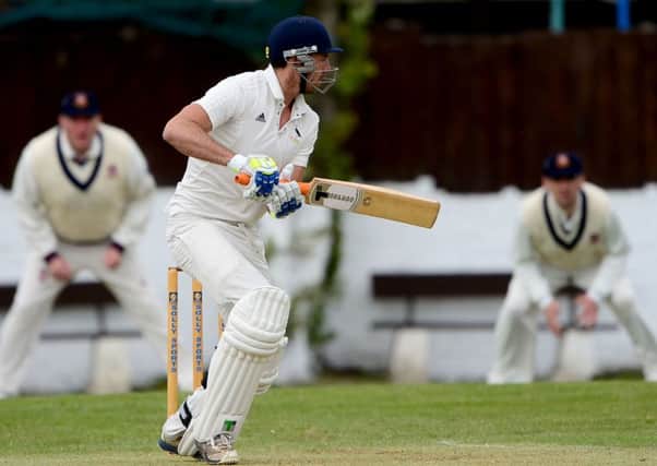 Hanging Heaton batsman Joe Fraser, in action against Cleckheaton on Saturday, was unable to prevent them bowing out of the Heavy Woollen Cup.