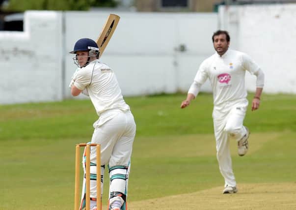 Morley batsman James McNichol clips Spen Victorias Abid Awan away