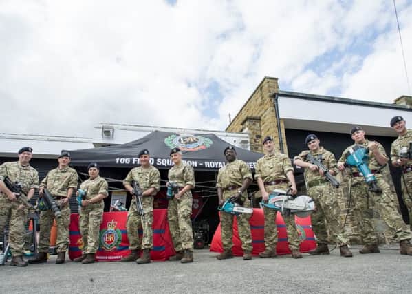 Picture by Allan McKenzie/YWNG - 060615 - Press - Batley TA Open Day - Batley TA Centre, Batley, England - Members of the 106 Field Squadron brandish their equipment.