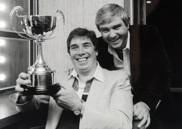 Singer Gene Pitney (right) presenting the Club of the Year award to Mr Smith at the Frontier Club Batley on May 7 1985.