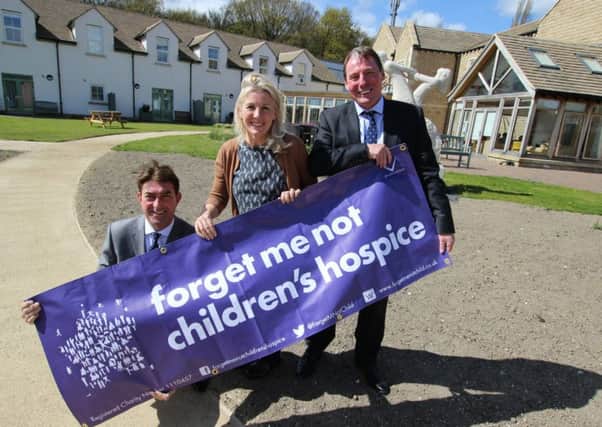 Simon Whalley, sales director, and Wayne Gradwell, managing director, at Persimmon Homes West Yorkshire launch their fundraising campaign with the Hospices nurse consultant, Liz Lyles.