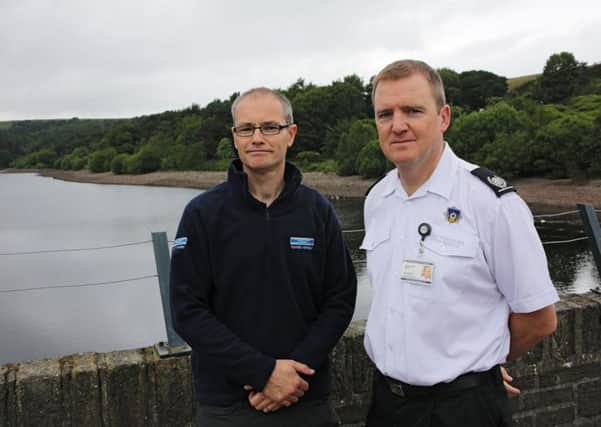 West Yorkshire Fire and Rescue and Yorkshire Water promote the dangers of bathing in Reservoirs. Alastair Harvey from Yorkshire Water and Jim Butters area manager of West Yorkshire Fire Service.