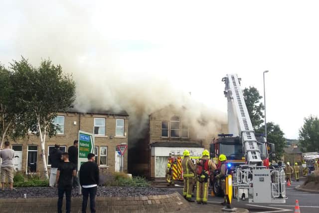 Firefighters tackle building fire on Huddersfield Road, Ravensthorpe. Photo sent in by reader George Andrew