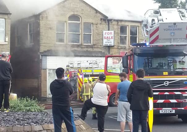 Firefighters tackle building fire on Huddersfield Road, Ravensthorpe. Photo sent in by reader George Andrew