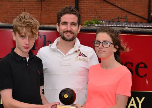 Keith Mortimer Memorial Trophy finalists Jack Bowes (left) and winner Georgia Jewitt with Thomas Mortimer.