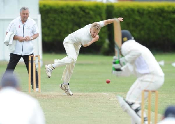 Robert Pearl sends down a delivery during Birstalls Central Yorkshire League Premier Division game against Altofts last Saturday. Picture: Steve Riding