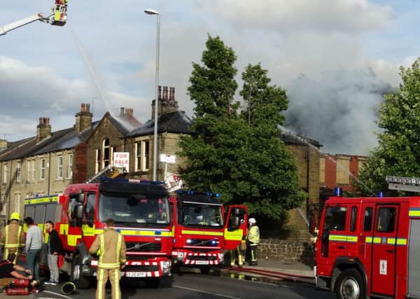 The fire at the old Dewsbury Auctions building in Huddersfield Road, Ravensthorpe. Picture by Ash Milnes.