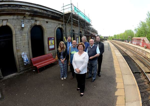 NEW ROOF Coun Gwen Lowe with FOBS and Northern Rail representatives.