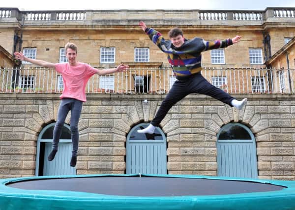 Lewis Galloway and Frazer Nugent, of The Mallrats, enjoy themselves at Bramham Park where they will be appearing on the BBC Introducing Stage at the Leeds Festival.