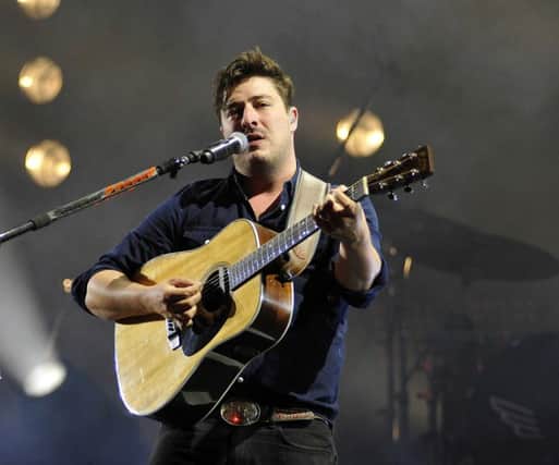 Headline act: Marcus Mumford on the main stage at the Leeds Festival. Picture: Ian Harber