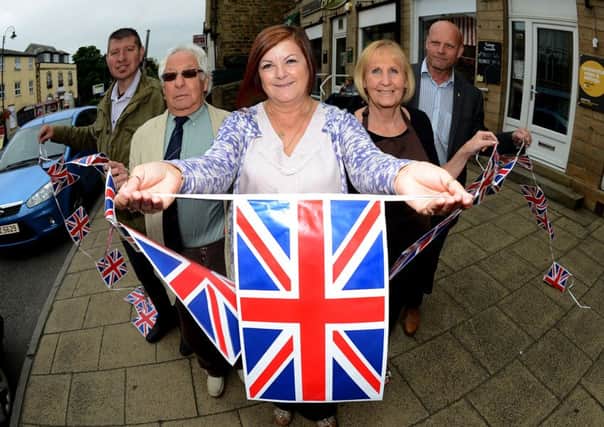 Mayor of Mirfield Vivien Lees-Hamilton, along with councillors and local businesses promote the Great British High Street (AB206b0915)