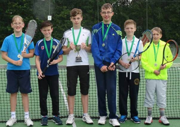 Thornhill junior tennis players celebrated winning the Huddersfield League title