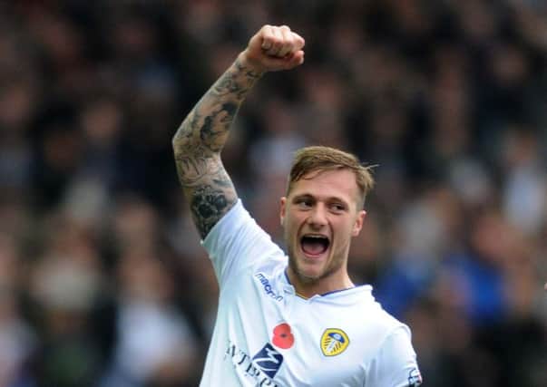 Liam Cooper, who scored and was injured in Leeds United's game against Brighton.