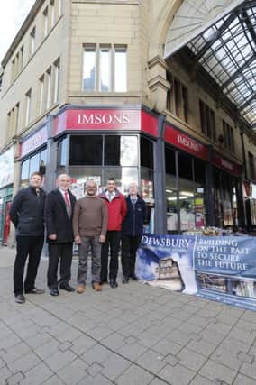 Councillor Eric Firth outside the Imsons building,   Queensway Arcade, which is spearheading a Kirklees Council regeneration project. with Daryl Le-Vine, soaeb Laher, John Lambe and Steve Graystock