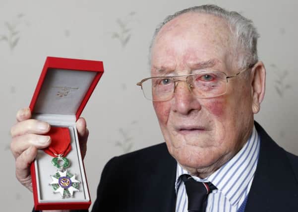 91-year-old D-day landings veteran Oliver Coulthard has received a French Legion of Honour medal.