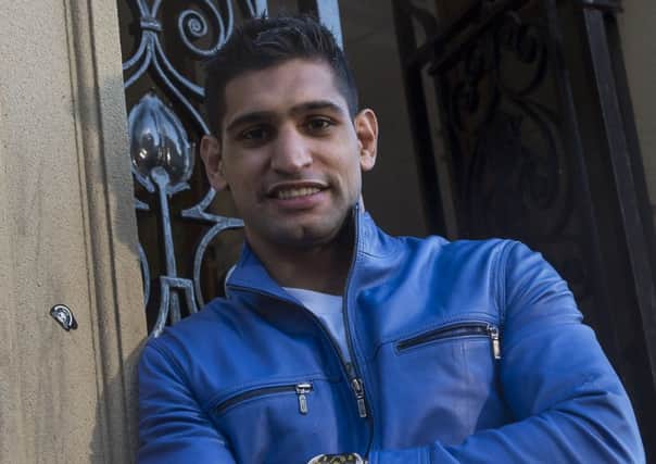 Amir Khan is set to attend Fridays charity boxing night in Dewsbury.